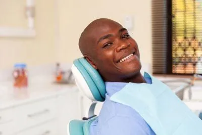man smiling during his dental visit to Rugby Dental Arts in Charlottesville, VA