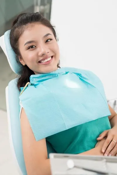 woman laying back in the dental chair before her oral surgery at Rugby Dental Arts in Charlottesville, VA