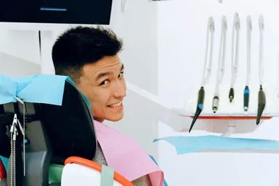 man smiling in the dental chair during his visit to Rugby Dental Arts in Charlottesville, VA